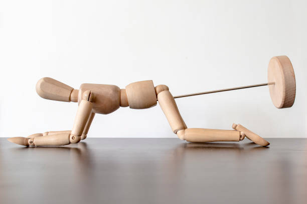 istock wooden figurine at a reception at the proctologist 676174376