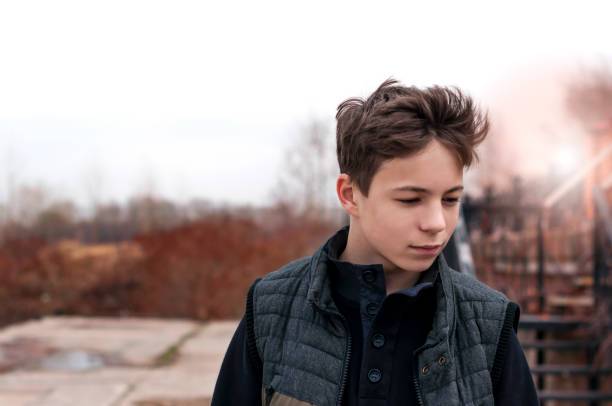 istock serious young man Standing by the stairs 676174698