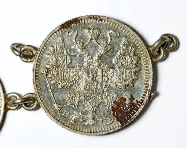 russian 15 copecks silvercoin from 1913 with eagle as part of a bracelet