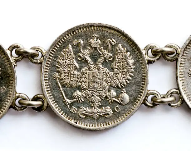 russian 10 copecks silvercoin from 1913 with eagle as part of a bracelet