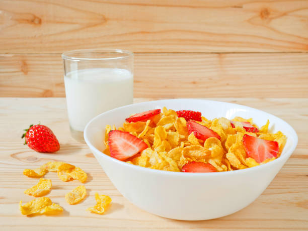 istock Golden cornflakes cereal with strawberries 676197890