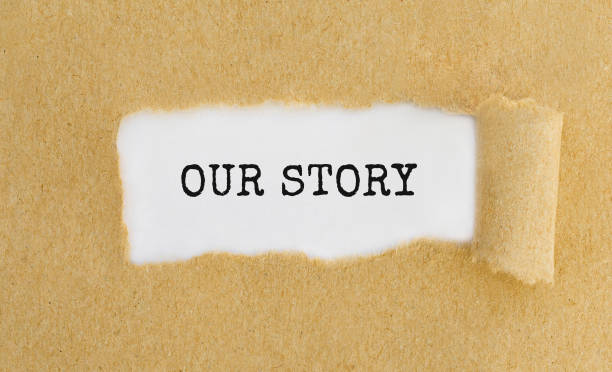 istock Text Our Story appearing behind ripped brown paper. 676199314