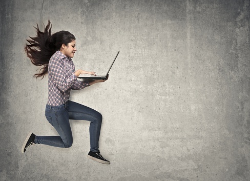 Running To Computer Using Laptop While Running Stock Photo - Download Image Now - Speed ...