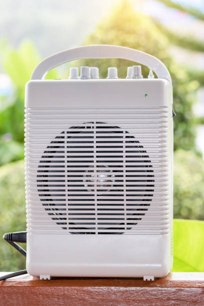 istock Portable wilreless Amplifier on wooden floor 676216674