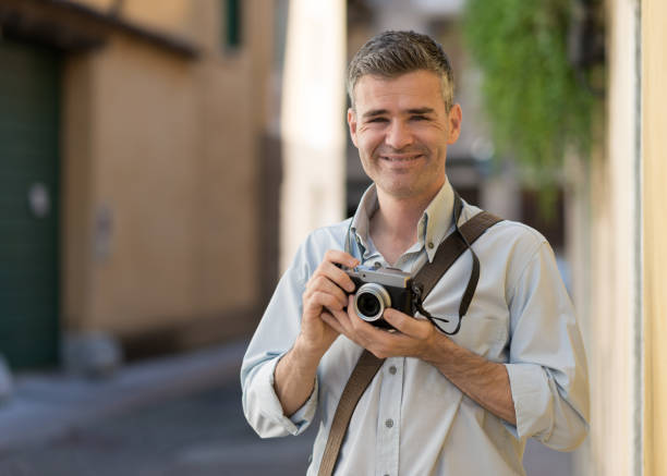 istock Photographer exploring a city 676219818