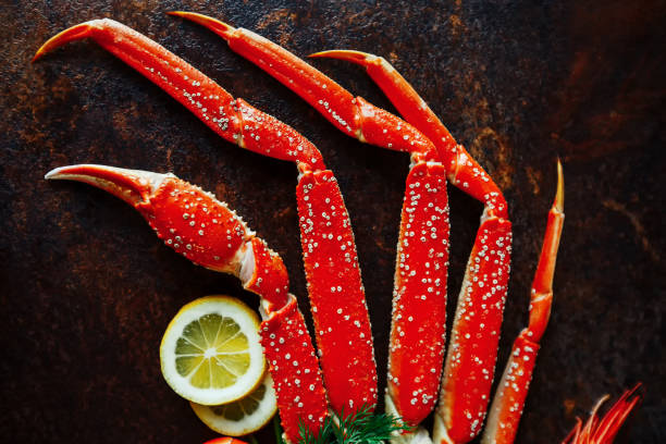 istock Crab claws and shrimp with lemon 676259444