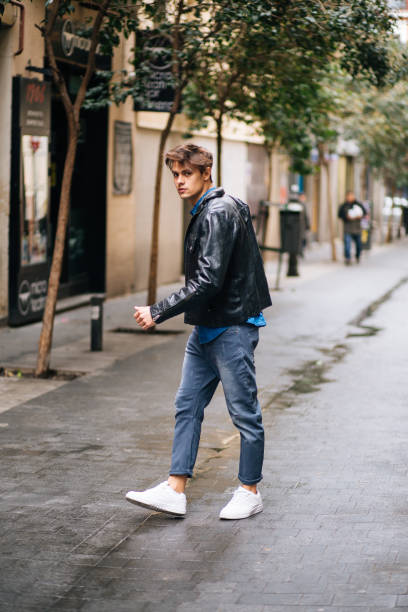 istock Confident and handsome young man with style in the city 676261882