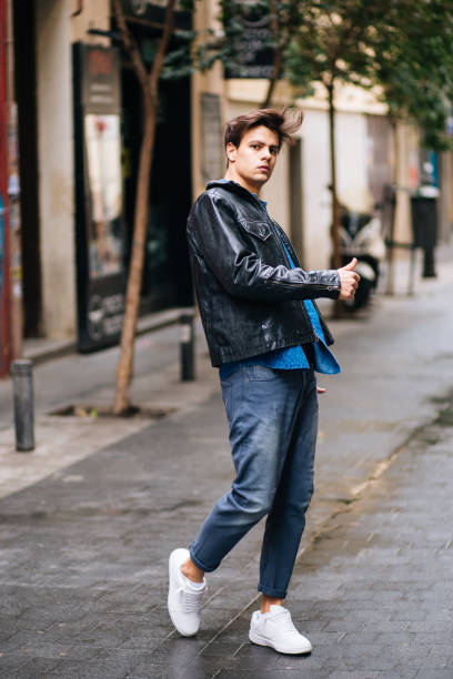 istock Confident and handsome young man with style in the city 676261950