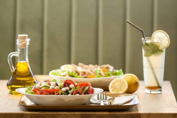 istock Plates of fresh salad 676285328