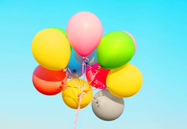 istock Colorful photo bundle air balloons on a sky blue background 676287636