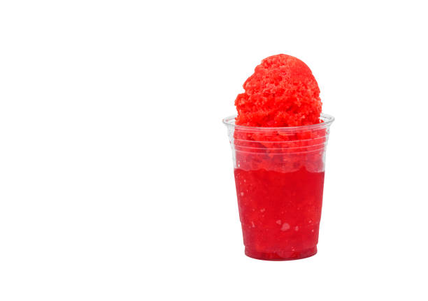 istock Red Hawaiian Shaved Ice or Snow cone in a clear plastic cup on a white background. 676312462