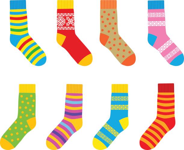 multi-colored socks Collection of multi-colored socks with patterns and stripes sock stock illustrations