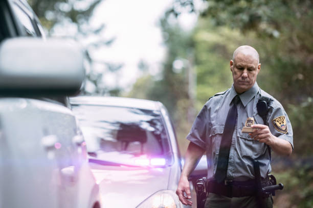 istock Police Officer Making Traffic Stop 676327188