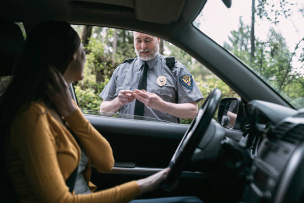 istock Police Officer Making Traffic Stop 676327384