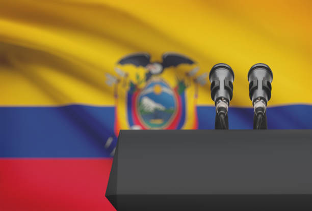 istock Pulpit and two microphones with a national flag on background - Ecuador 676339226