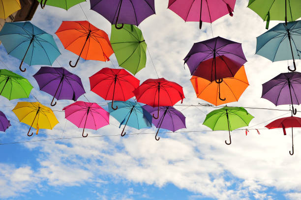 Colorful umbrellas in the blue sky