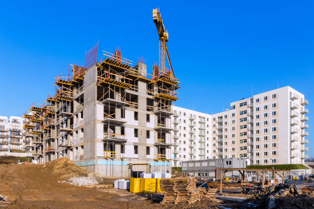 New complex of apartment buildings under construction stock photo