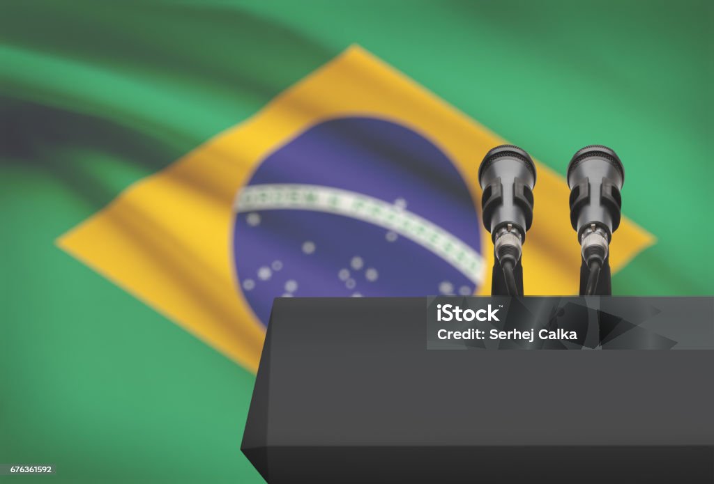 Pulpit and two microphones with a national flag on background - Brazil Pulpit and two microphones with a flag on background - Brazil Election Stock Photo