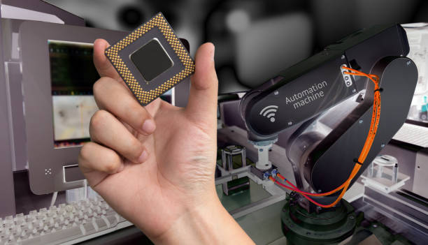 istock Industry 4.0 , Machine learning and artificial intelligence concept. Man suit hand holding Ai chipsets and blue tone of automate wireless Robot arm in smart factory background with flare light effect 676364578