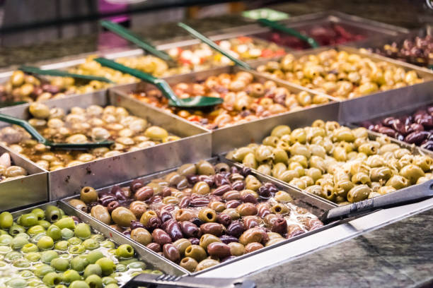 istock Assorted olives for sale in a supermarket 676365334