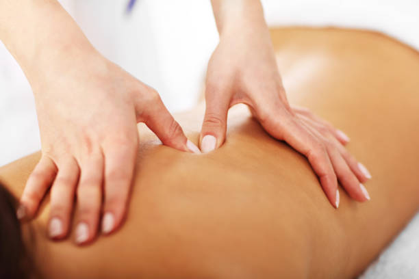 istock Beautiful woman getting massage in spa 676365660