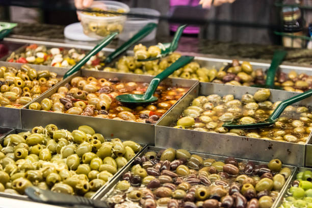 istock Assorted olives for sale in a supermarket 676365984