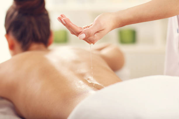 istock Beautiful woman getting massage in spa 676367272