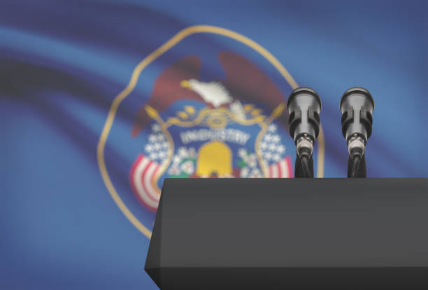 istock Pulpit and two microphones with USA state flag on background - Utah 676368478