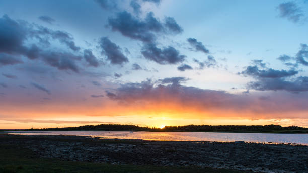 istock Beautiful sunset over the lake 676380740