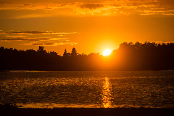 istock Beautiful sunset over the lake 676380744