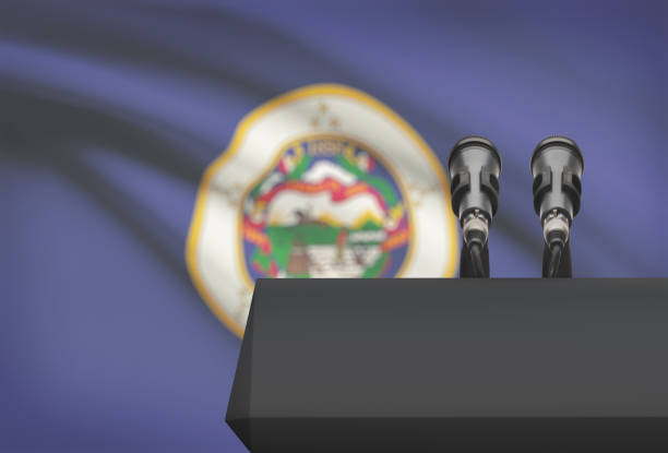 istock Pulpit and two microphones with USA state flag on background - Minnesota 676384012