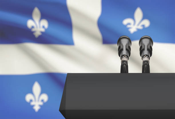 Pulpit and two microphones with Canadian province flag on background - Quebec stock photo