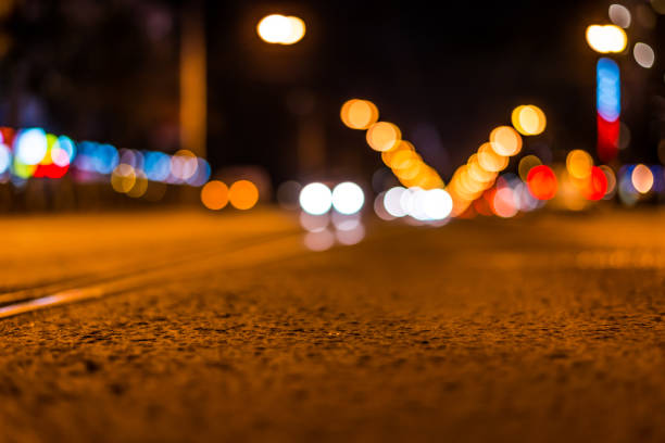 istock Night highway with rails, cars go over it 676394382