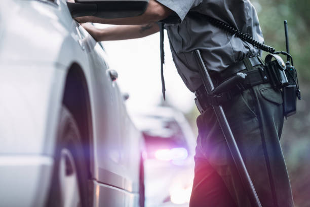istock Police Officer Making Traffic Stop 676408884