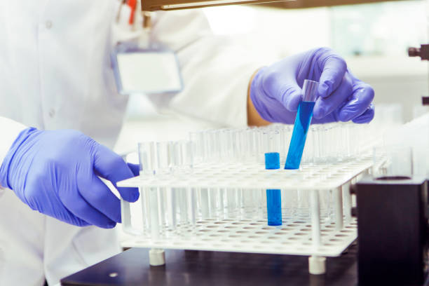 istock Scientist with laboratory background and concept 676408974
