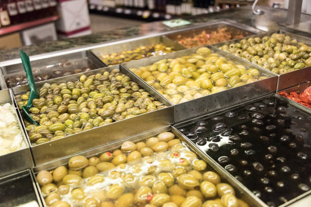 istock Assorted olives for sale in a supermarket 676409616