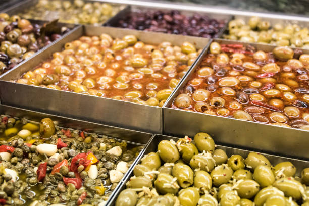 istock Assorted olives for sale in a supermarket 676409736
