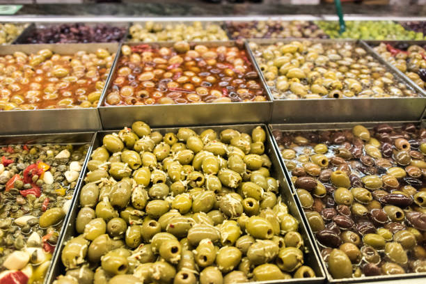 istock Assorted olives for sale in a supermarket 676410426