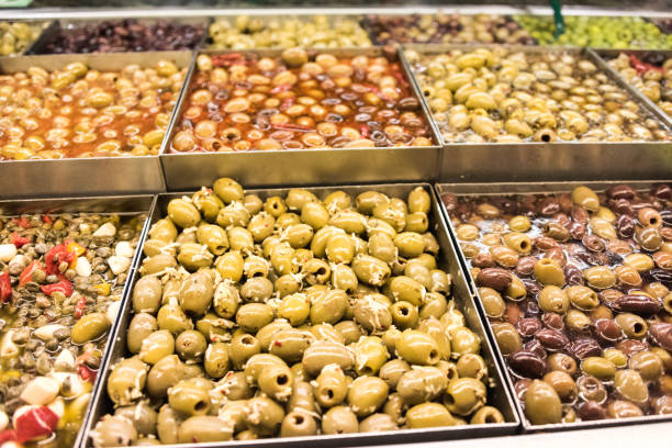 istock Assorted olives for sale in a supermarket 676410432