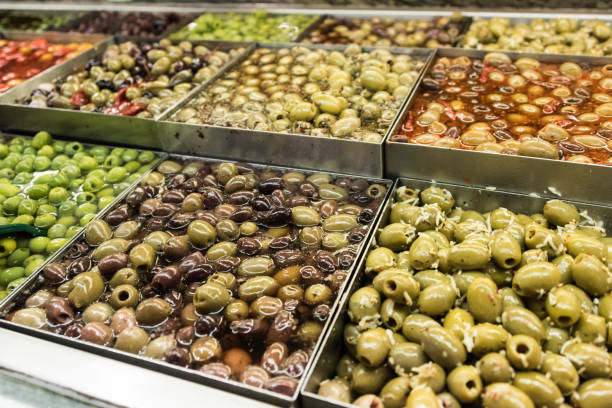istock Assorted olives for sale in a supermarket 676410662