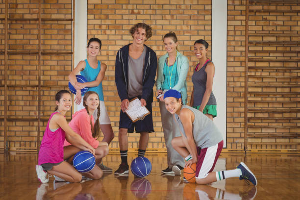 istock High school kids discussing game plan in the court 676418216
