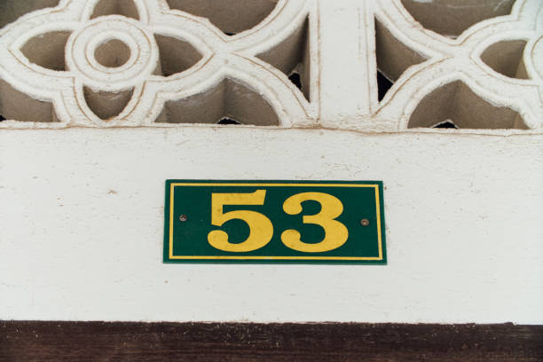 istock House number 53, yellow. Plate with a frame on self-tapping screws 676432630