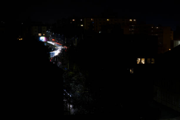 ночной вид на город с огнями. словакия - lowlight стоковые фото и изображения