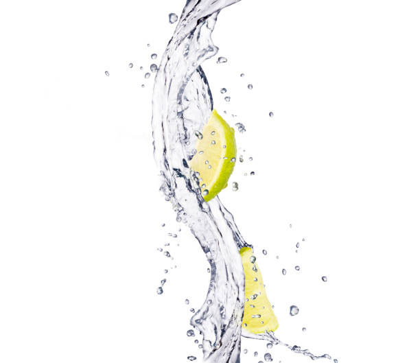 Lemon Slices in Water Splash Lemon Slices in Water Splash flushing water stock pictures, royalty-free photos & images