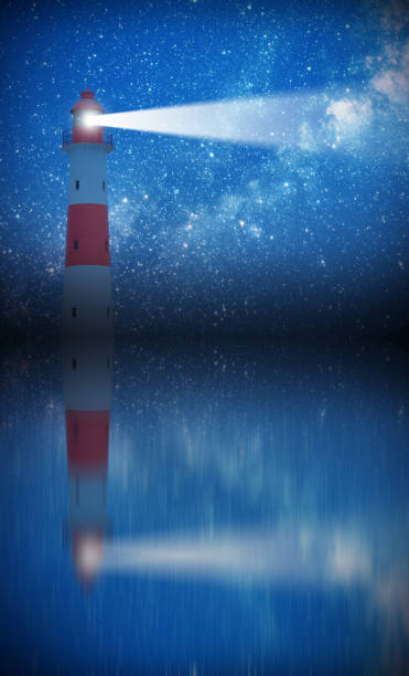istock Lighthouse in action with beam and starry sky 676486856