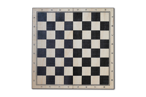 Tablero de ajedrez de madera aislada sobre fondo blanco. Vista desde arriba. photo