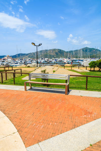 istock Bench in Porto Giunco harbour, Sardinia island, Italy 676514184