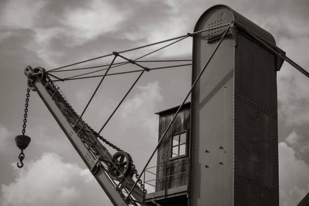 istock Old ancient wooden elevator crane in harbor of Genoa. 676517710