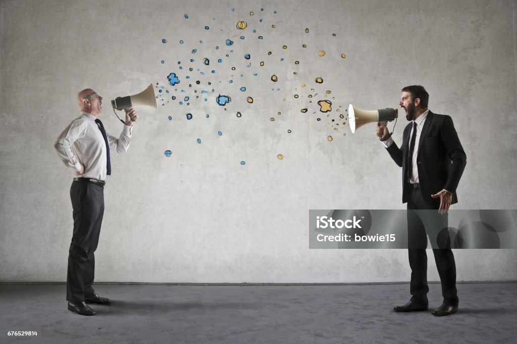 Screaming men Men are screaming into megaphones Megaphone Stock Photo