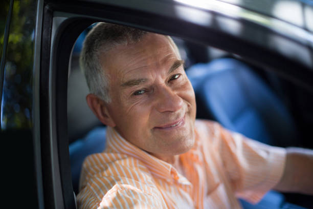 istock Senior man traveling in car 676529932